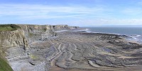 /album/erosion-del-suelo/a350px-wavecut-platform-southerndown-pano-jpg/